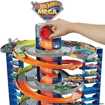 Hot Wheels City Mega Garage Playset and Track with 1:64 Scale Toy Car, Corkscrew Elevator, and Storage for Over 60 Cars, for Kids Ages 4 and Up 2 Hot Wheels City Mega Garage Playset and Track with 1:64 Scale Toy Car, Corkscrew Elevator, and Storage for Over 60 Cars, for Kids Ages 4 and Up - Image 2